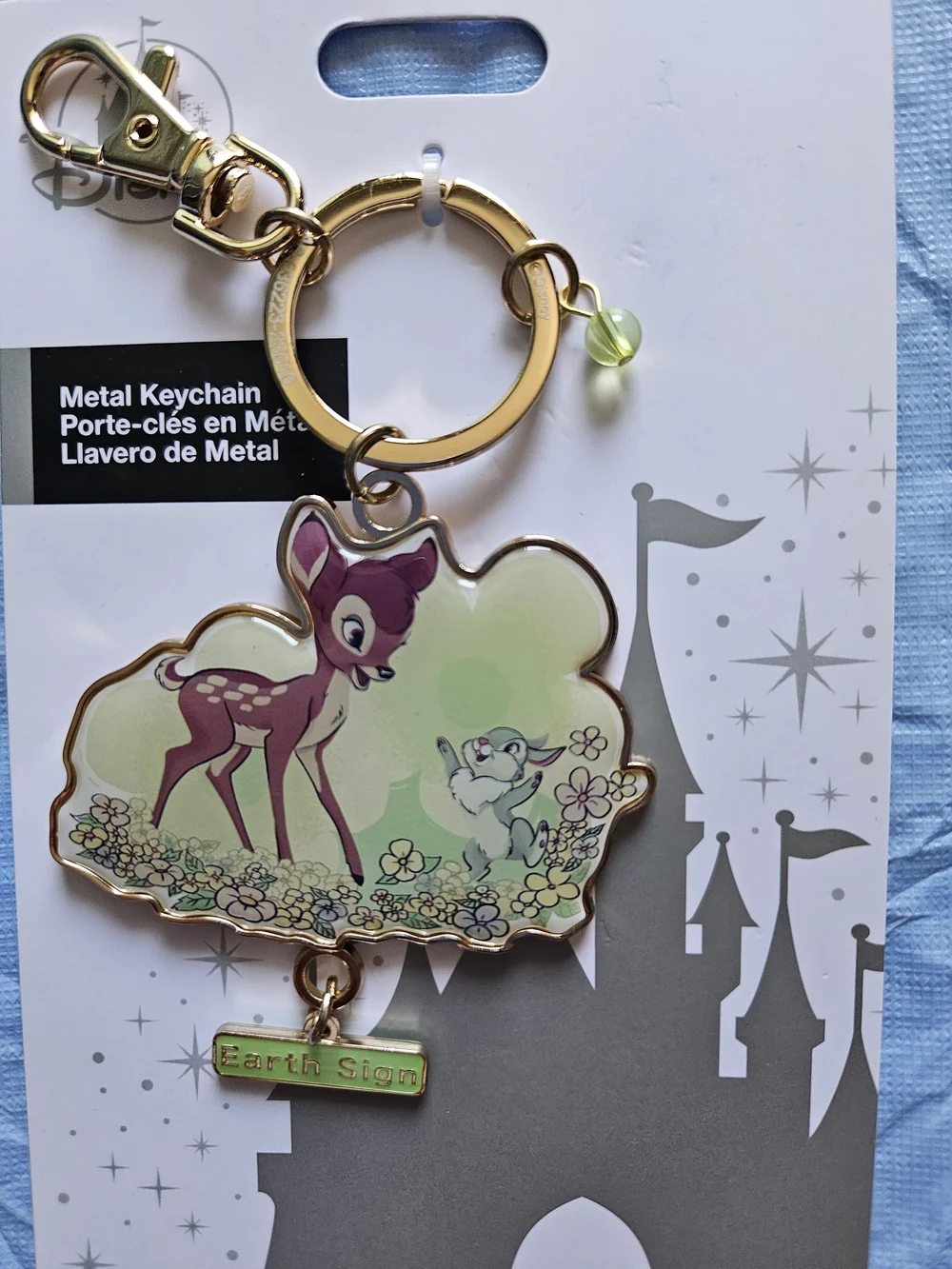 Disney Parks astrology keychain features Bambi and Thumper